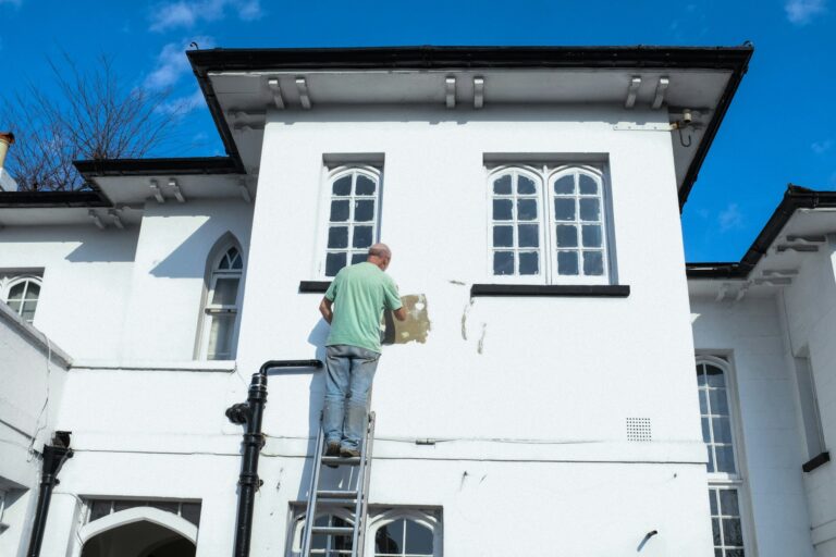Exterior house painting in progress