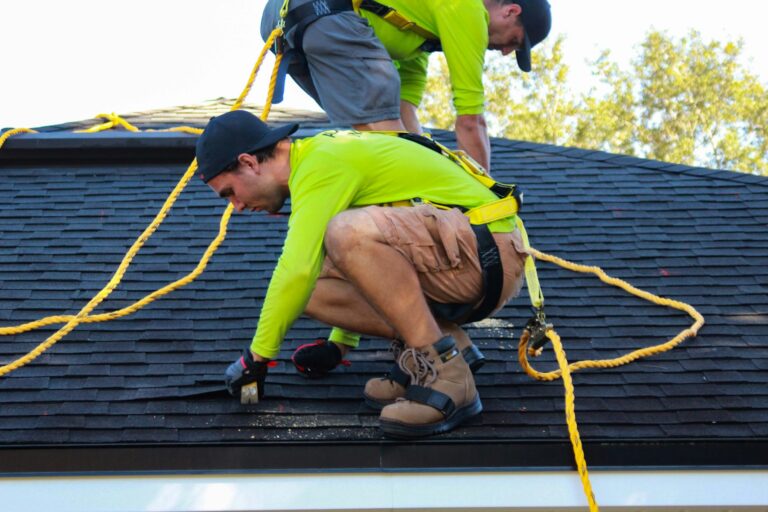 Roofing crew at work on a residential roof
